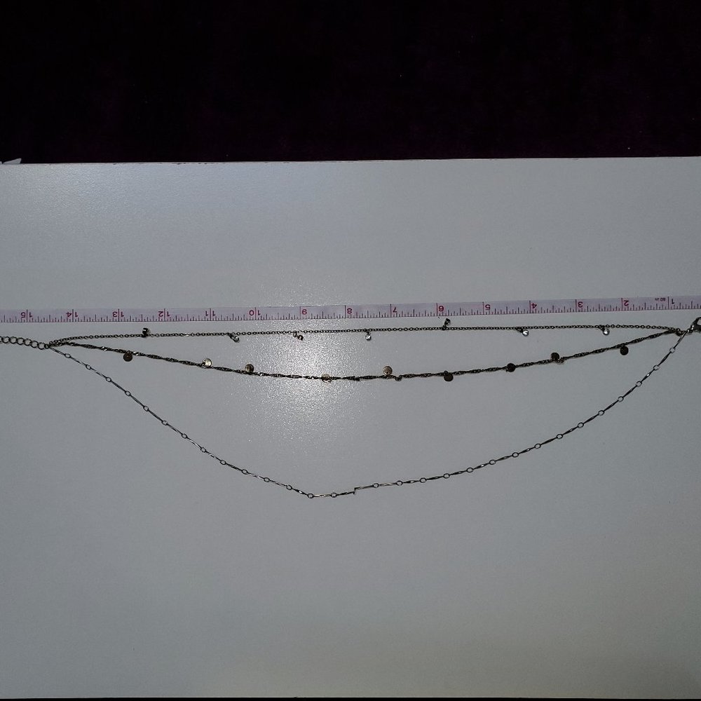 Costume Triple thread necklace with black and white stars